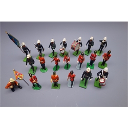  Twenty die-cast figures of soldiers and bandsmen by Britains, Ducal etc, including Bahamas Police band with certificate, Royal Marines etc  