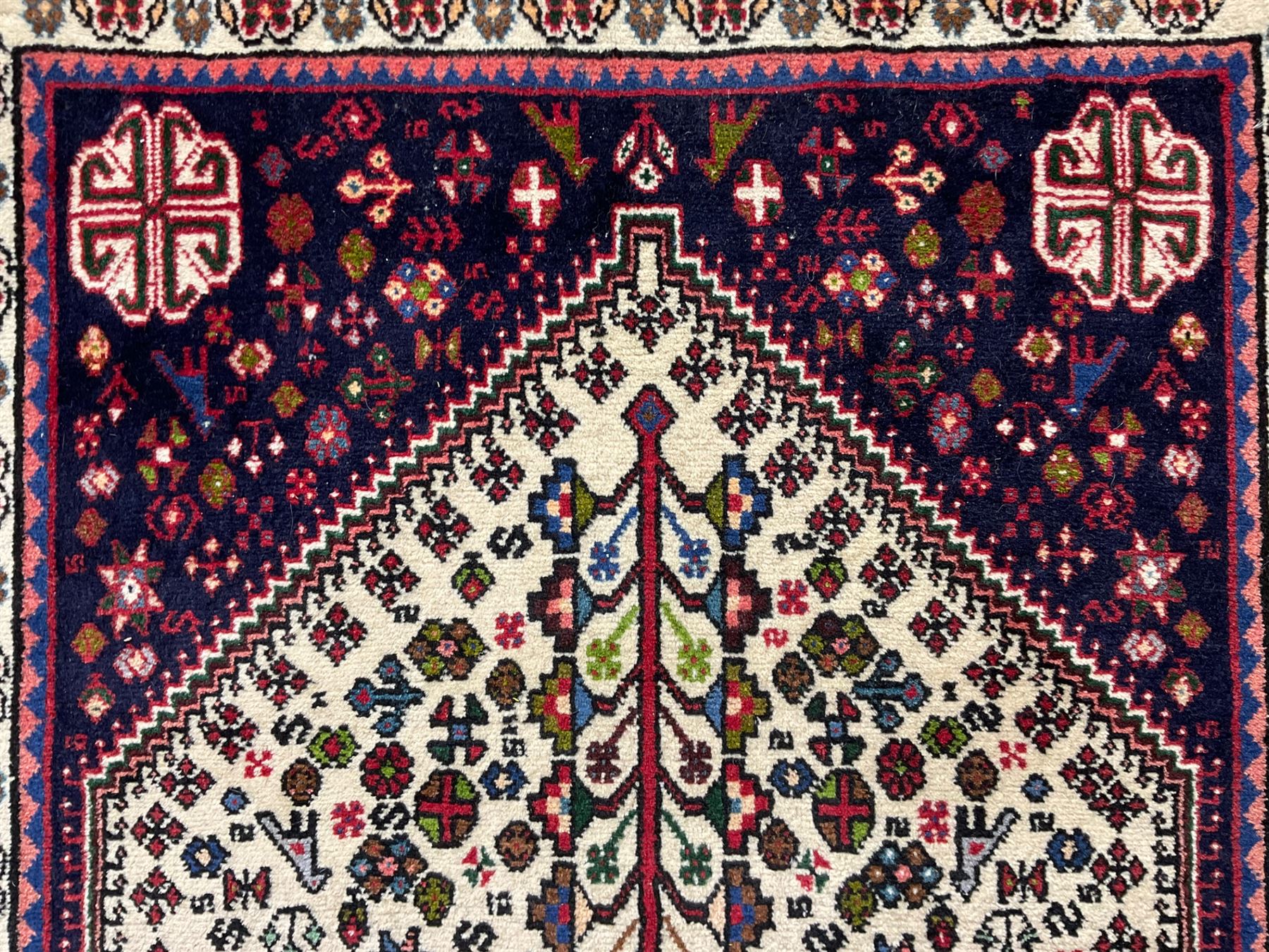 Persian Abadeh indigo ground runner rug, ivory field with pole medallion surrounded by plant and bird motifs and contrasting spandrels, border with interlaced flowerheads