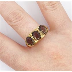 9ct gold three stone oval smoky quartz ring, with pierced heart design gallery, London 1972