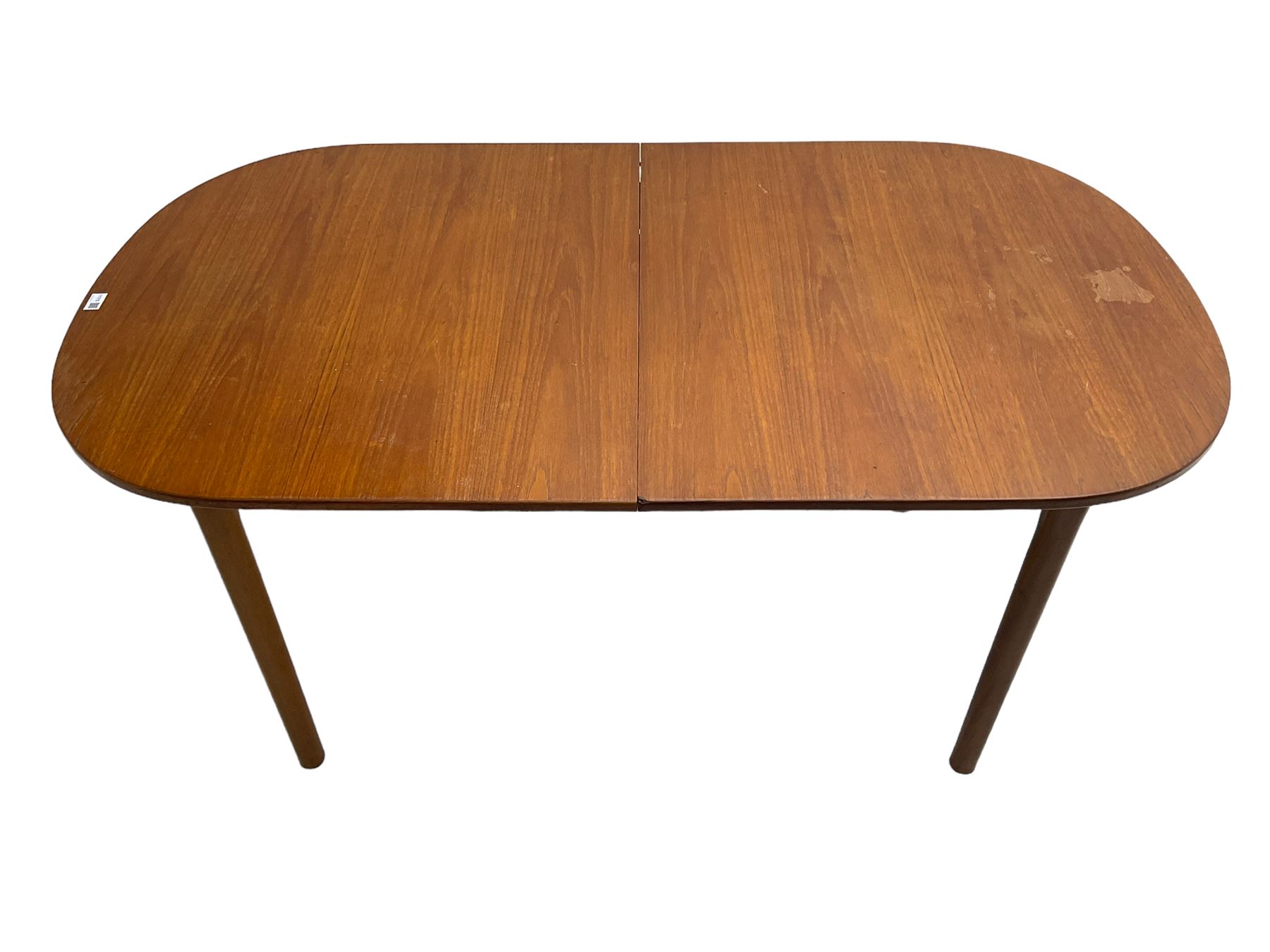 AH McIntosh & Co of Kirkaldy - mid-20th century teak extending dining table, rectangular top with rounded corners, concealed integrated double leaf, raised on tapered supports, 'Furniture by McIntosh sticker to underside of leaf