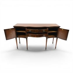 Georgian design mahogany serpentine sideboard, shaped top over two central drawers flanked by cupboard doors, flame mahogany veneered fronts with satinwood stringing, oval brass handles, shaped apron, on square tapering supports with spade feet