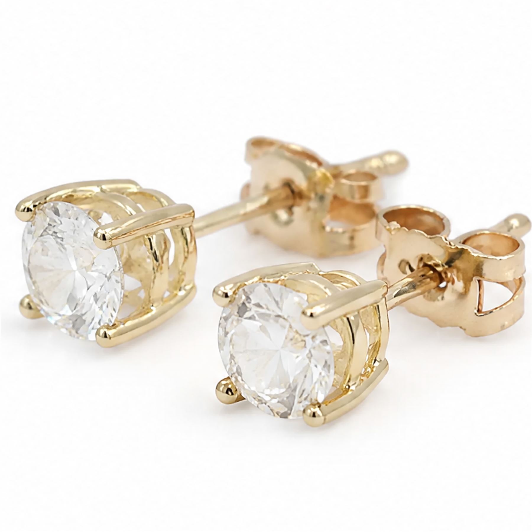 Pair of 9ct gold lab grown diamond earrings, each stud set with a single round brilliant cut diamond, stamped 375, total diamond weight approx 1.00 carat