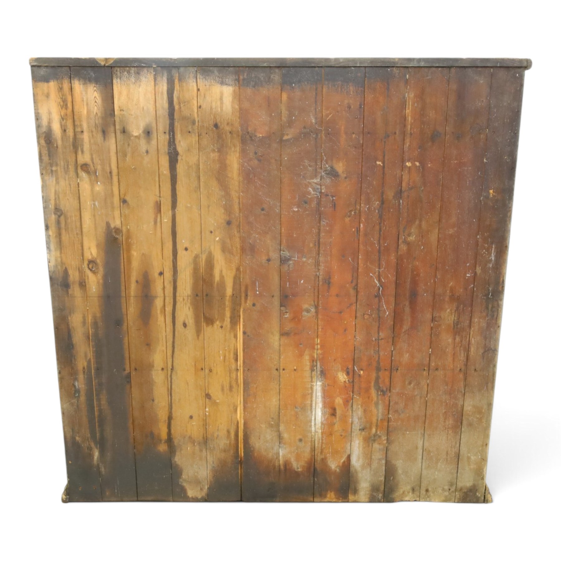 19th century painted and lacquered pine clerks desk bureau on cupboard, hinged fall-front enclosing three compartments, over slatted panelled doors enclosing two perforated shelves, on skirted base, in rustic forest green and red finish