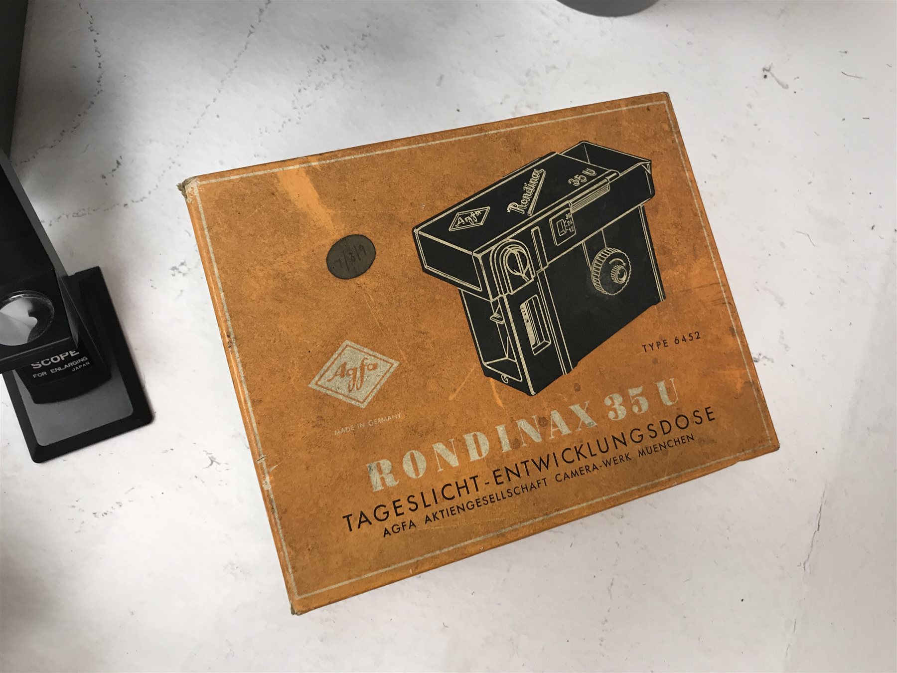 Large quantity of photo developing, dark room and photography equipment - quantity of Fogro 2'' x 2'' slide frames, PHILIPS movielight PSG125, Paterson 2 print forceps, atlas photo flash M3 clear, two Paterson 35mm developing tanks, Ilford photography paper 12'' x 16''and 8'' x 10'', Fujifilm photography paper 8'' x 10'' and 12'' x 16'', Rondinax 35U developing tank boxed, Simma Roller, two Ilford processing drums 30x40cm and 20x25cm, two other processing drums, Paterson 35mm contact proof printer, S&K 60D-C colour analyser etc... in three boxes