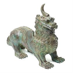 Chinese patinated bronze temple lion, W32cm