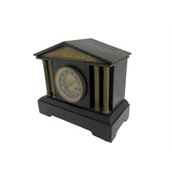 French slate mantle clock striking on a gong. 