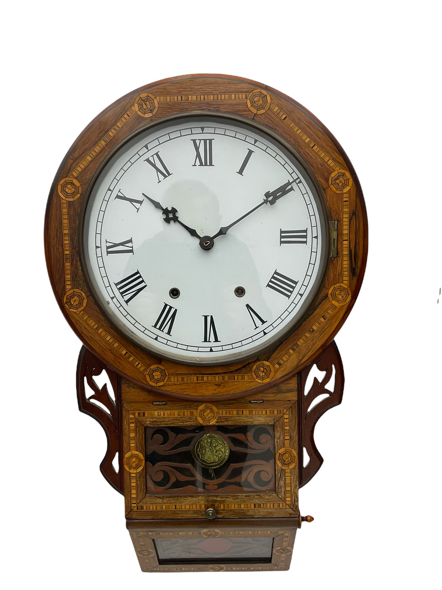 An American late 19th century oak and mahogany drop dial wall clock by