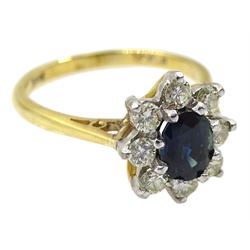 Gold oval sapphire and diamond cluster ring, stamped 18ct, sapphire approx 0.60 carat