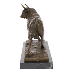 Bronze figure, modelled as a bull, upon naturalistically modelled rectangular base signed Milo and with foundry mark, raised upon black marble base, H27cm L36cm