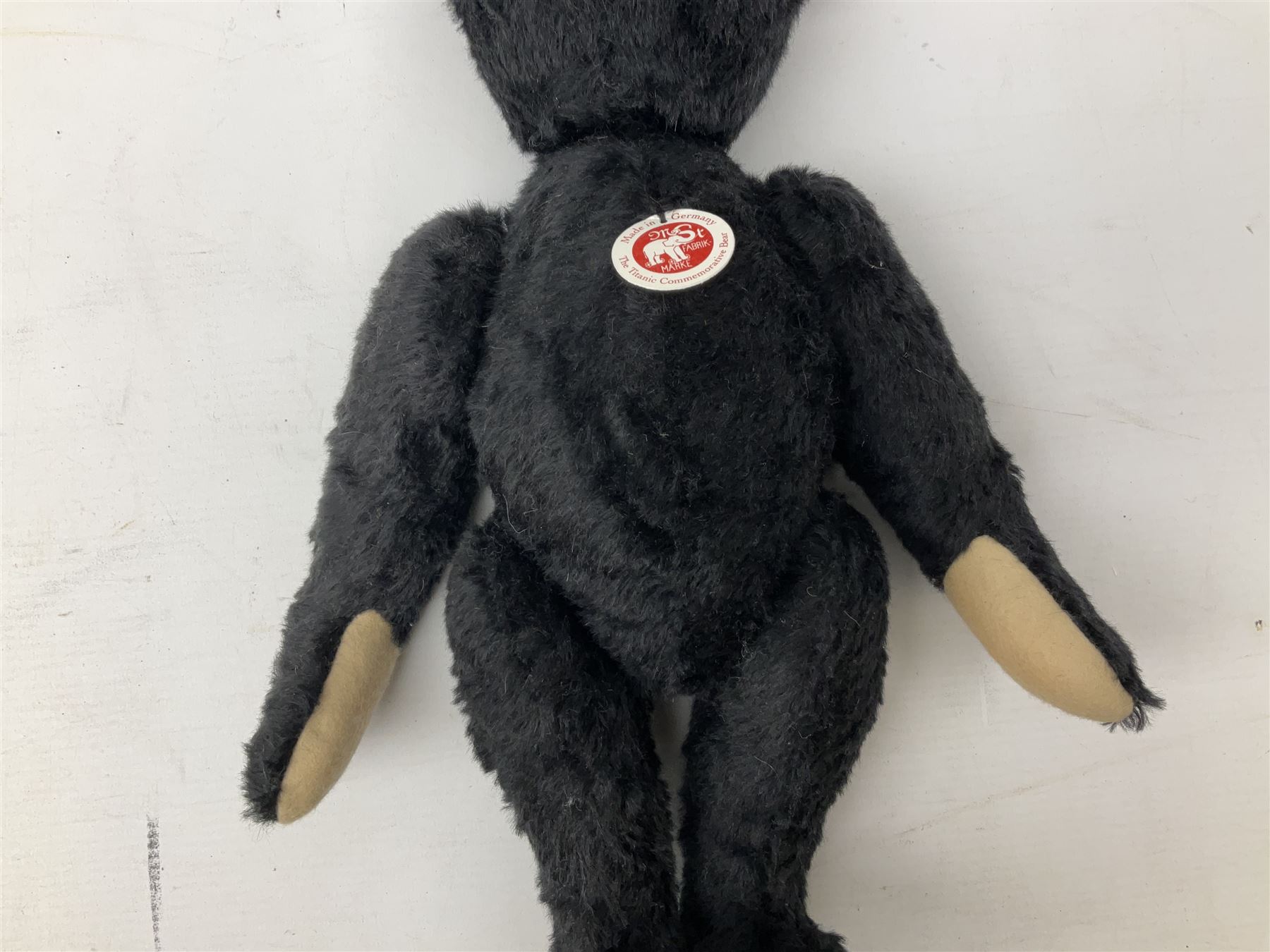 Steiff 'Leo the 1912 Titanic Mourning Bear', in black mohair with tag, limited edition no. 605, with original certificate and box