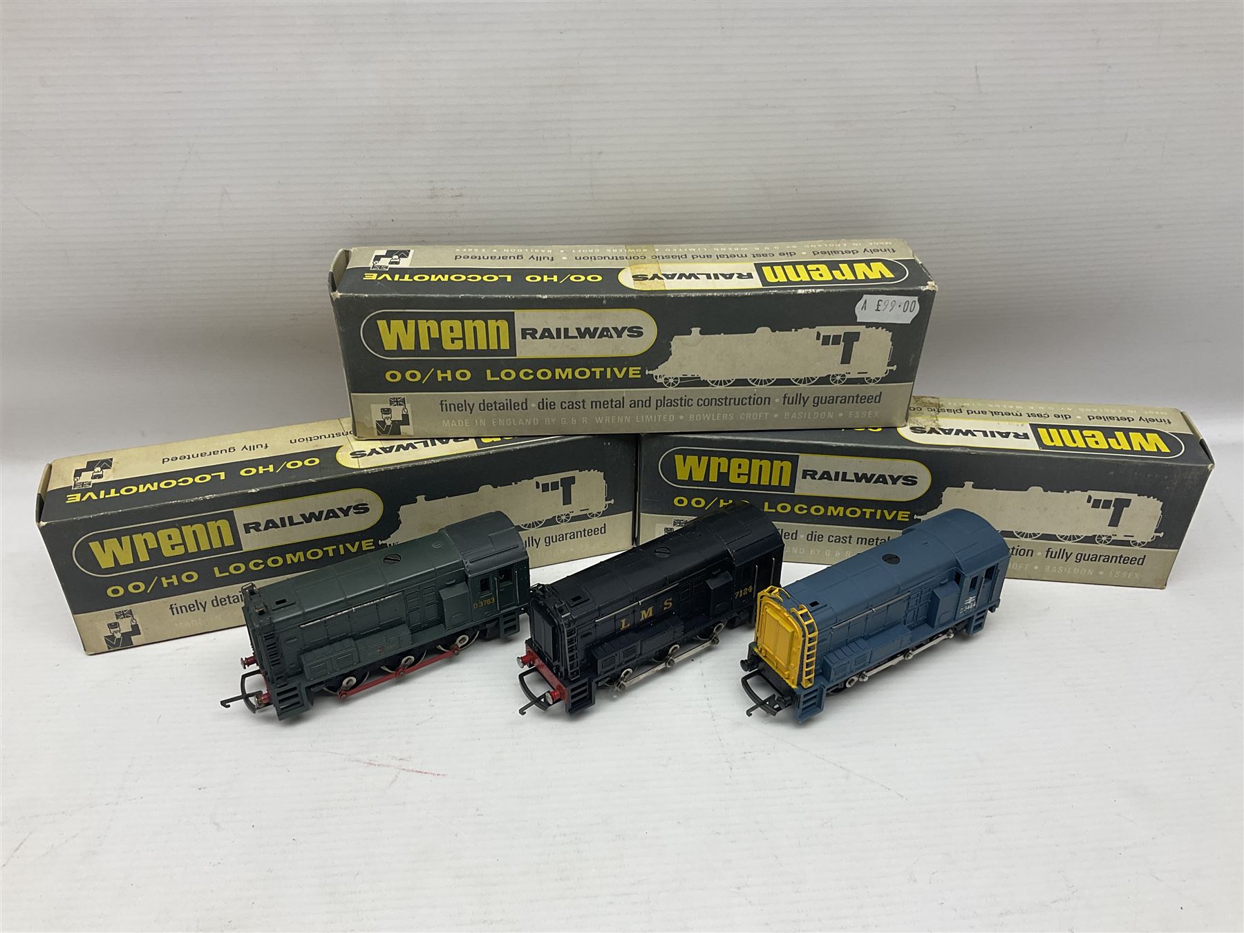 Wrenn '00' gauge - three Class 08 0-6-0 Diesel Shunting locomotives - No.7124 in LMS Black; No.D3464 in BR Blue; and No.D3783 in BR Green; all boxed with instructions (3)