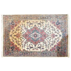 Persian design ivory ground rug with overall floral pattern (275cm x 183cm); contemporary beige ground rug decorated with stripes (175cm x 125cm)