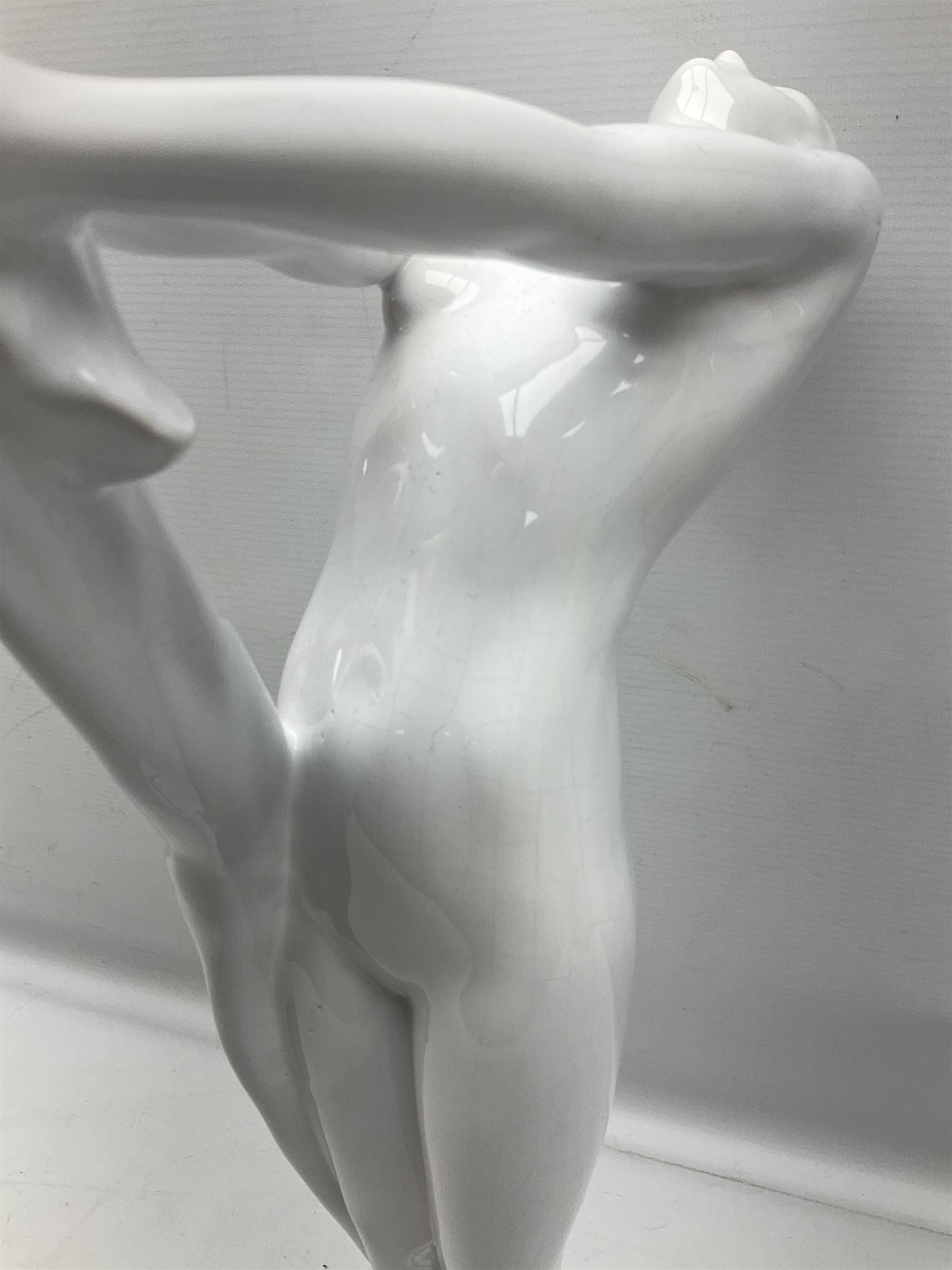 Art Deco style lamp modelled as a nude female dancer, with draped folds of linen, H46cm