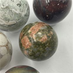 Six mineral specimens spheres, comprising jasper red, spotted agate, unakite, sardonyx, petrified wood and bloodstone, D2cm