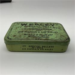 Webley 'Junior' .177 air pistol with top lever action and wooden grips; marked The Webley Junior .177 Webley & Scott Ltd Birmingham 4 Made in England to left side of cylinder; numbered 078 to muzzle and J3007 to trigger guard; L21cm; together with part tin of Webley .177 Special Pellets NB: AGE RESTRICTIONS APPLY TO THE PURCHASE OF THIS LOT.