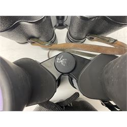 Eleven pairs of binoculars to include Lieberman & Gortz 20x65, Stem (USSR) 7x50, Helios 10x50 Field, Prinz 12x50, Tasco 8x40, Tasco 10x50, etc