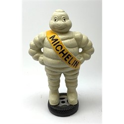 A cast iron Michelin man, H38.5cm. 