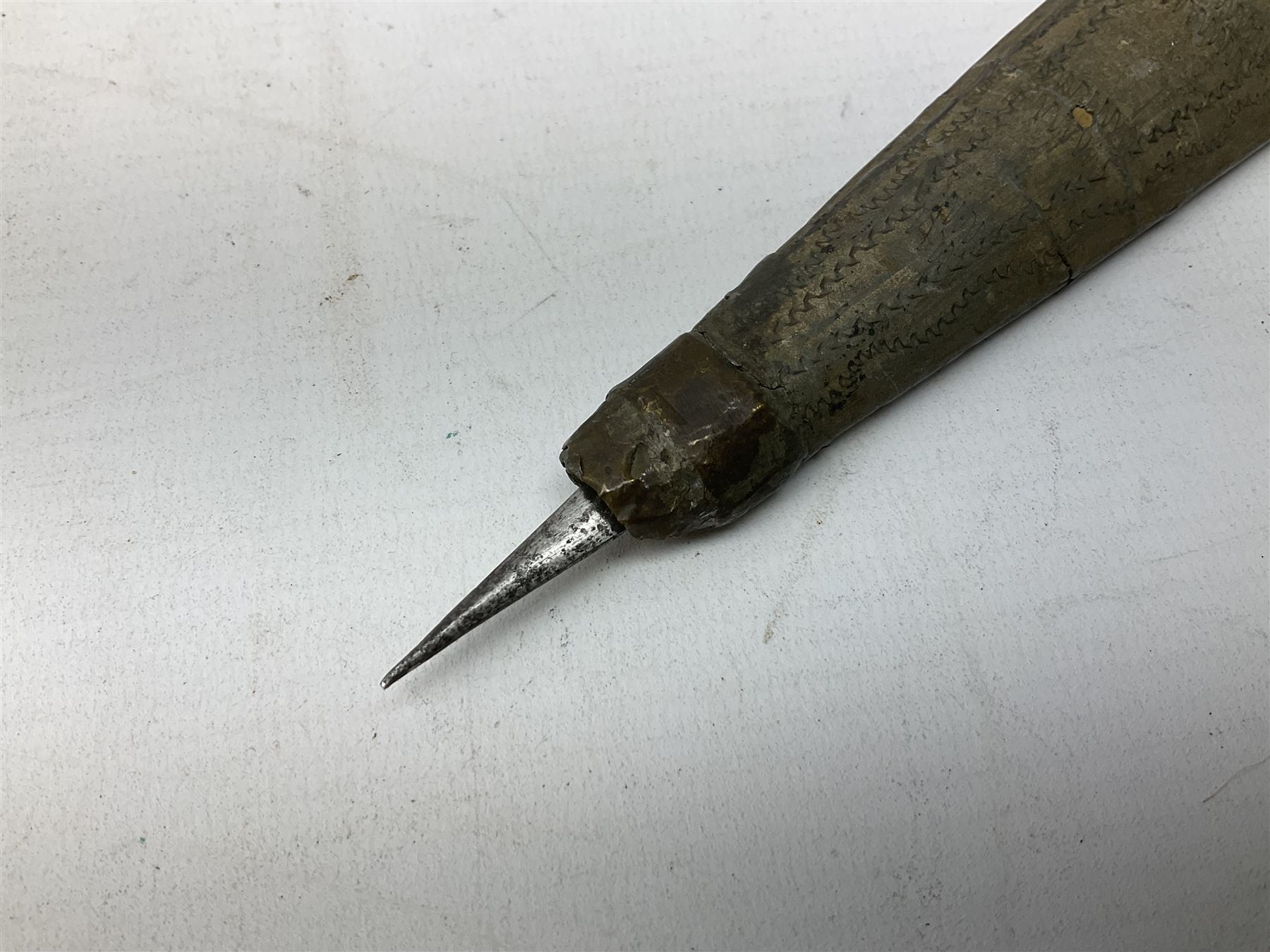 19th century Khanjali dagger, 33.5 cm double edged fullered blade with stamped makers marks, ornate cast grip, with engraved white metal scabbard, 46cm overall