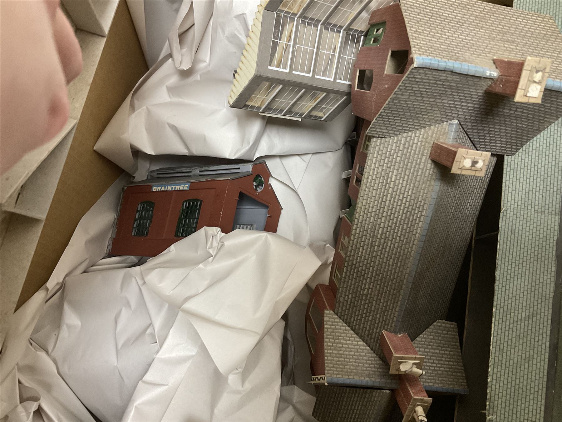 Extensive collection of scratch built buildings for use on ‘00’ gauge model railway layout, small amount of accessories and tools with a quantity of railway magazines and leaflets, in three boxes 