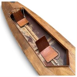 Mid-20th century varnished marine plywood two-person touring kayak, the decked hull with pointed bow and stern, two circular Holt-Allen access hatches and central open cockpit fitted with seats