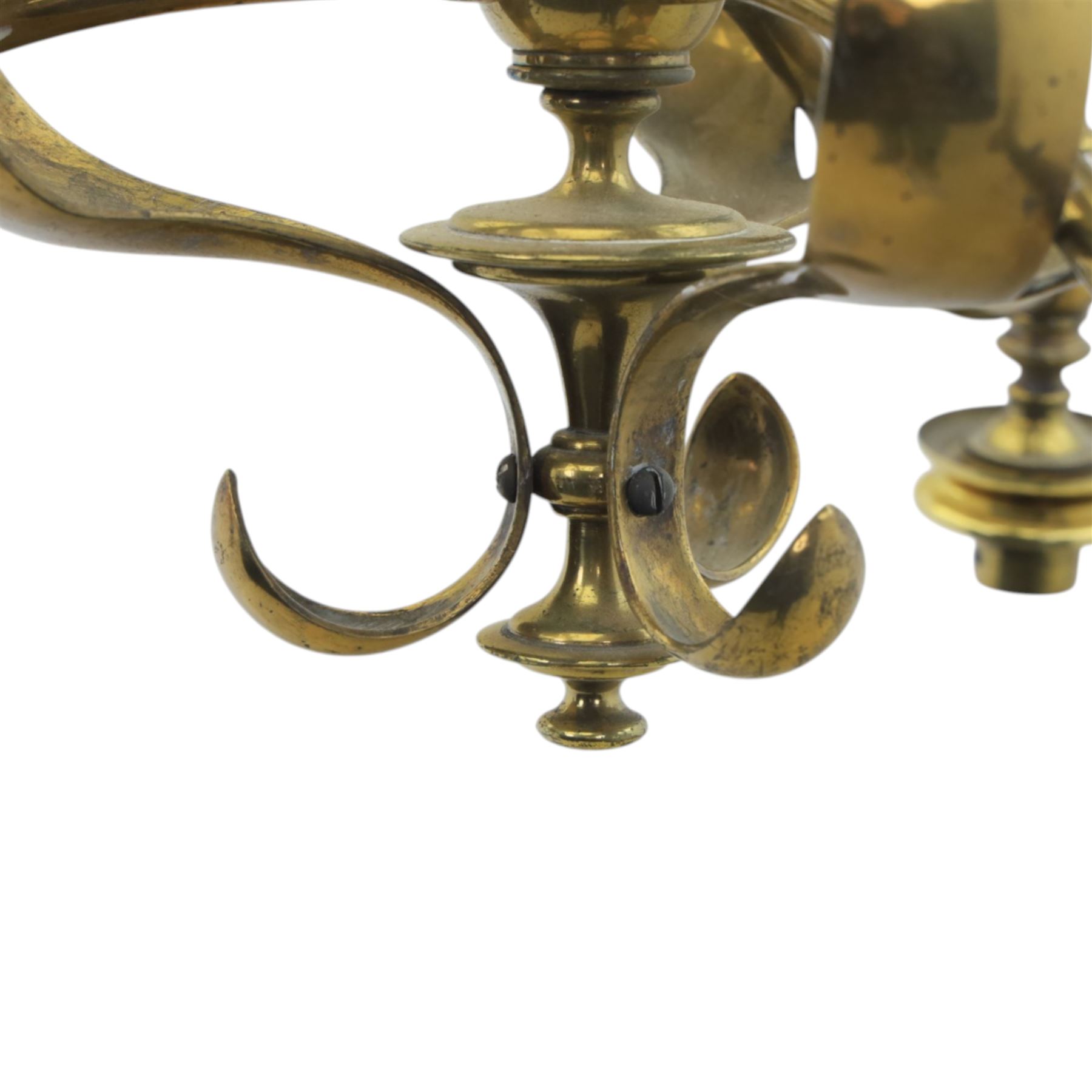 20th century Art Nouveau brass wall light, vertical stem with three scrolling arms terminating in lamp holders, central baluster element with curving supports