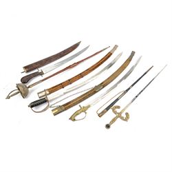 Five reproduction swords, including cour