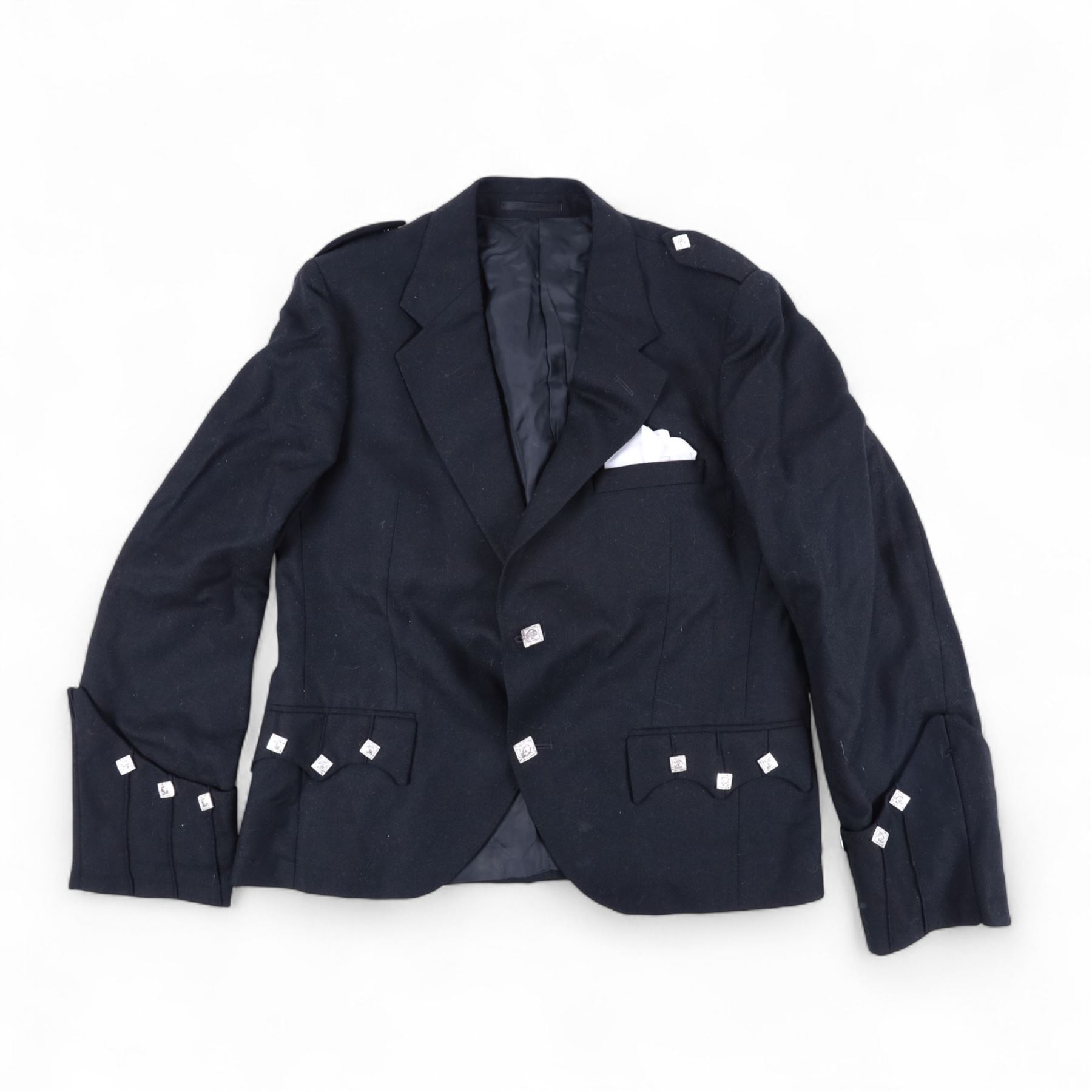 Piping regalia, comprising Armstrong tartan kilt with two kilt pins, three sporrans, including fur example, two jackets, Glengarry hat, other hats, collection of shirts, socks, ties, Hecsan shoes, dirk and belt