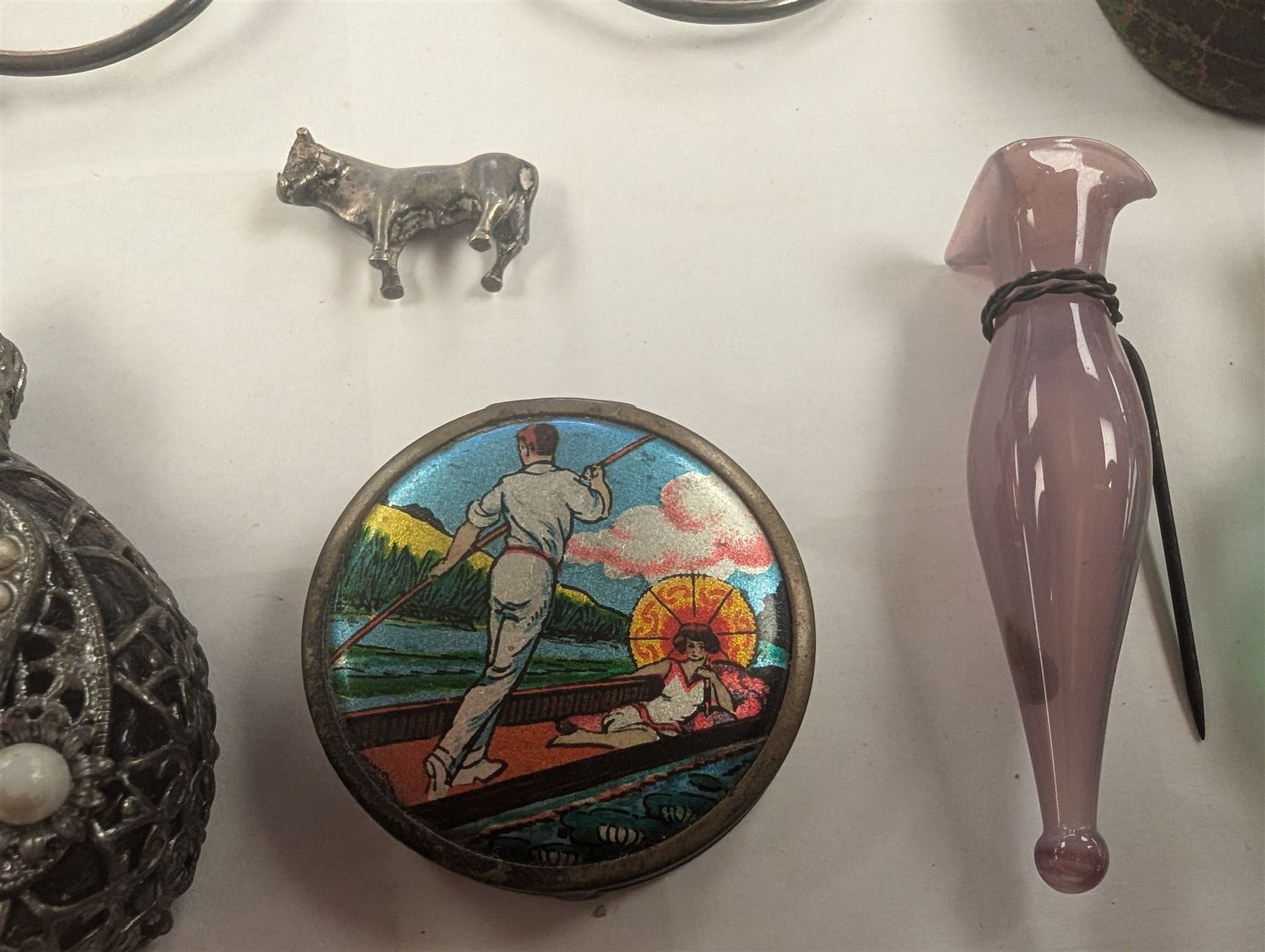 Faceted green glass scent bottle with brass cover, other scent bottles, pair of lorgnettes, Spode thimble, glass posy holder, etc 