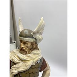 Clay Japanese Hakata dolls, comprising example modelled as a Geisha in blue kimono holding a fan, H41cm, another Geisha in pale pink kimono, H34cm, a Samurai, H35cm, and a composite figure of a Viking, H42.5cm. 