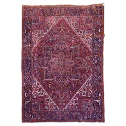 North West Persian Heriz hand-knotted carpet, brick-red field with a large central angular...