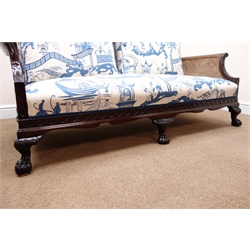  Edwardian George lll style mahogany double caned bergere sofa, moulded frame with Vitruvian scroll frieze on cabriole legs with hairy paw feet, sprung seat with loose back cushions upholstered in Sanderson Pagoda River pattern fabric, W163cm, D84cm, H78cm  