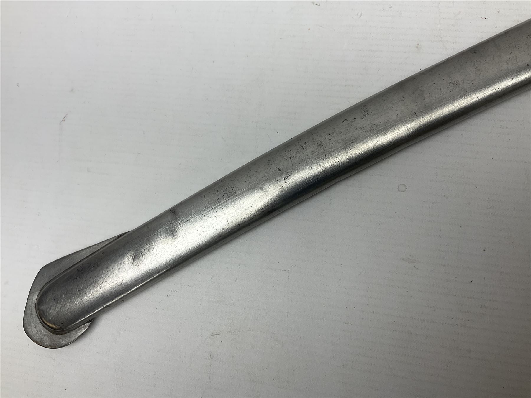 Early 19th century French Lancers officer's sword c1810, the 84cm curving fullered blade retaining most of its bluing, gilding and engraved decoration, inscribed I.S.& C. to ricasso (for Schimelbusch), brass three-bar hilt with elongated elliptical langets and wire-bound leather grip; in polished steel scabbard with two brass suspension rings L100cm overall