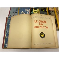 Twenty one first edition Herge, 'The Adventures of Tin Tin' books published by Casterman Bruxelles, with French text and coloured comic strip illustrations throughout; comprising Tintin Au Congo 1946, Tintin En Amerique 1946, Les Cigares du Pharaon 1955, Le Lotus Bleu 1946, L'Oreille Cassee 1943, L'ile Noire 1943, Le Sceptre d O'ttokar 1947, Le Crabe Aux Pinces D'or 1943, L'Etoile Mysterieuse 1942, Le Secret de la Licorne 1943, Le Tresors de Rackan Le Rouge 1945, Les 7 Boules de Cristal 1948, Le Temple du Soleil 1949, Au Pays de L'Or Noir 1950, Objectif Lune 1953, On a Marche sur la Lune 1954, L'Affaire Tournesol 1956, Coke en Stock 1958, Tintin au Tibet 1960, Les Bijous de la Castafiore 1963 and Vol 714 Pour Sydney 1968
