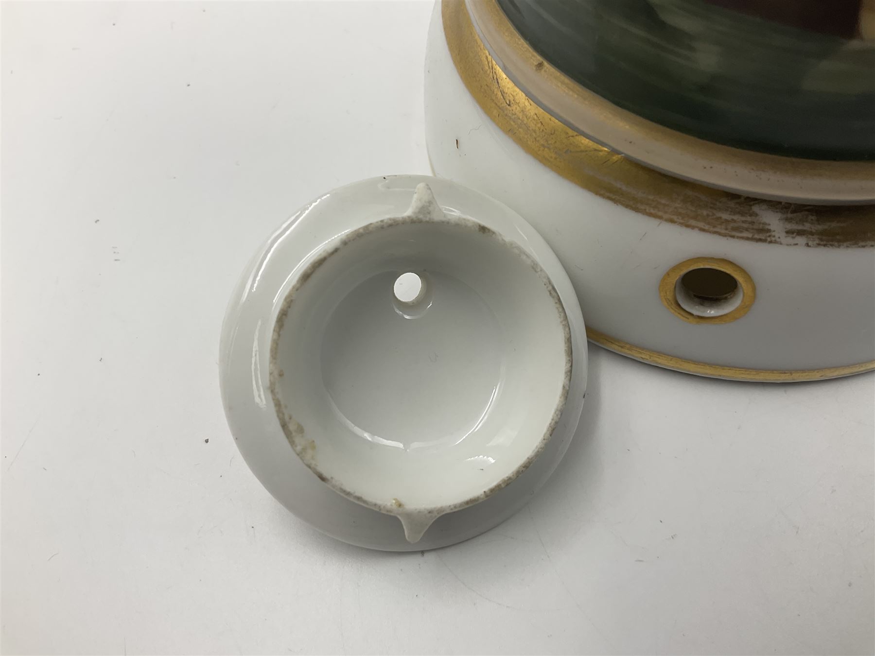 Two 19th century continental teapots and warmers, each teapot upon a cylindrical warming base, hand printed with seascapes, largest H22cm 