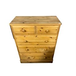 Solid pine chest, fitted with two short and three long drawers