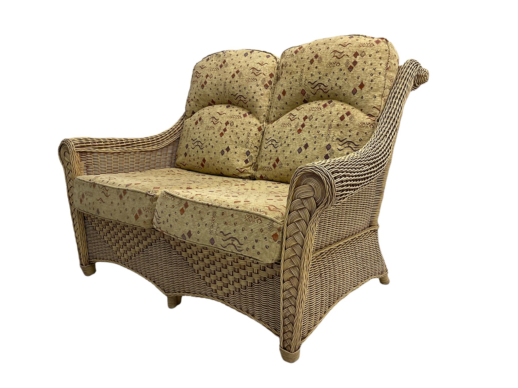 Four piece cane conservatory suite - two seat sofa (W130cm), pair of armchairs (W85cm), and coffee table (85cm x 60cm)