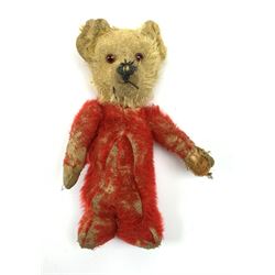 Chad Valley Rainbow Tubby or clown bear c1930s with wood wool filled red mohair body, applied glass eyes and vertically stitched nose and mouth, bears original red stitched Chad Valley Hygienic Toys label under left foot H10