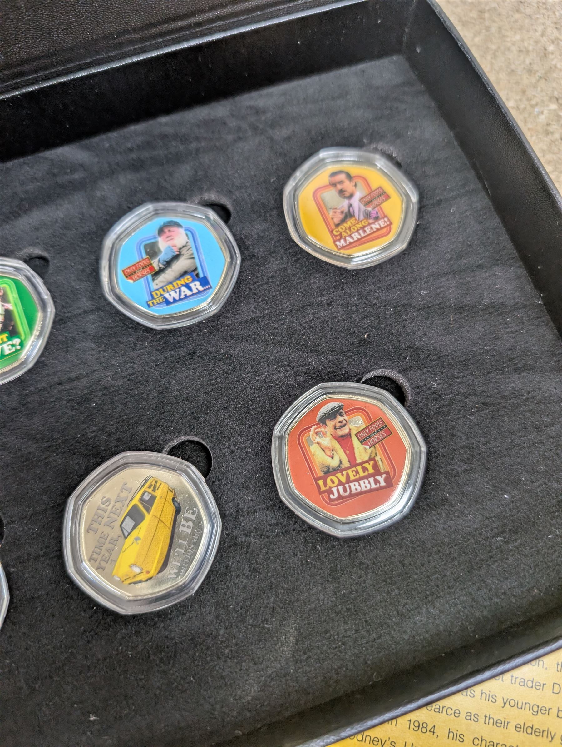 Collection of Only Fools and Horses memorabilia, including Westminster Mint limited edition fifty pence coin set, DVD box set, Corgi Reliant Regal, playing cards, framed bank notes, Griffin Cartoon of the bar scene, etc, together with a Vicar of Dibley DVD box set