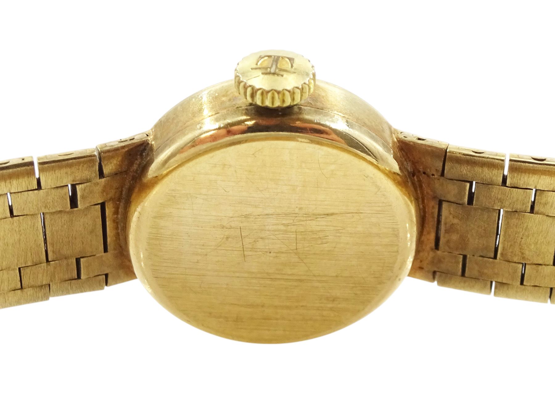 Tissot ladies 9ct gold manual wind wristwatch, silvered dial with baton hour markers, on integral 9ct gold bracelet, London 1972