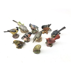  Ten Royal Worcester and Beswick matt glazed birds including a Red Cardinal, Blue Jay, Bull Finch, Grey Wagtail etc (10)  
