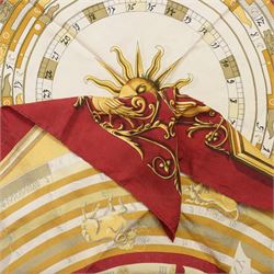 Hermes 'Astrologie' or 'Dies et Hore' silk scarf, in red and gold colourway, designed by Francoise Faconnet, 86cm x 86cm