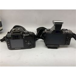 Three Olympus Camera bodies, comprising of OM-D E-M5, E-400 and E-450,   together with 'Samyang Mirror Lens 800mm 1:8.0DX', Olympus 'Zuiko Digital 40-150mm 1;3.5-4.5mm' lens, three other lenses and Velbon CX444 tripod 