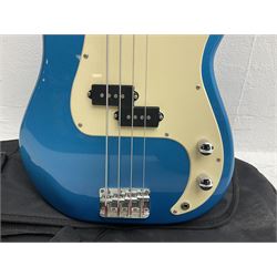 Richwood electric bass guitar in blue, cream and natural finish L117cm; in Fender soft carrying case; together with Behringer Thunderbird Bx108 amplifier date code 0 4 11.