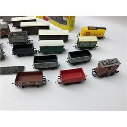 '00' gauge - thirty-seven wagons by Hornby, Tri-ang, Bachmann etc including four Hornby Dublo, three boxed petrol tankers, other tank wagons, open and covered wagons, coal wagons etc; predominantly unboxed (37)
