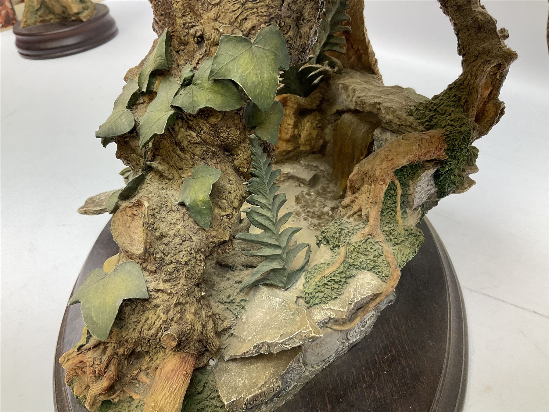 Country Artists figure of a peregrine falcon ' Lord of the Skies ' by David Ivey, limited edition, H44cm, together with two Sherratt and Simpson figures, both of peregrine falcons perched on branches. 