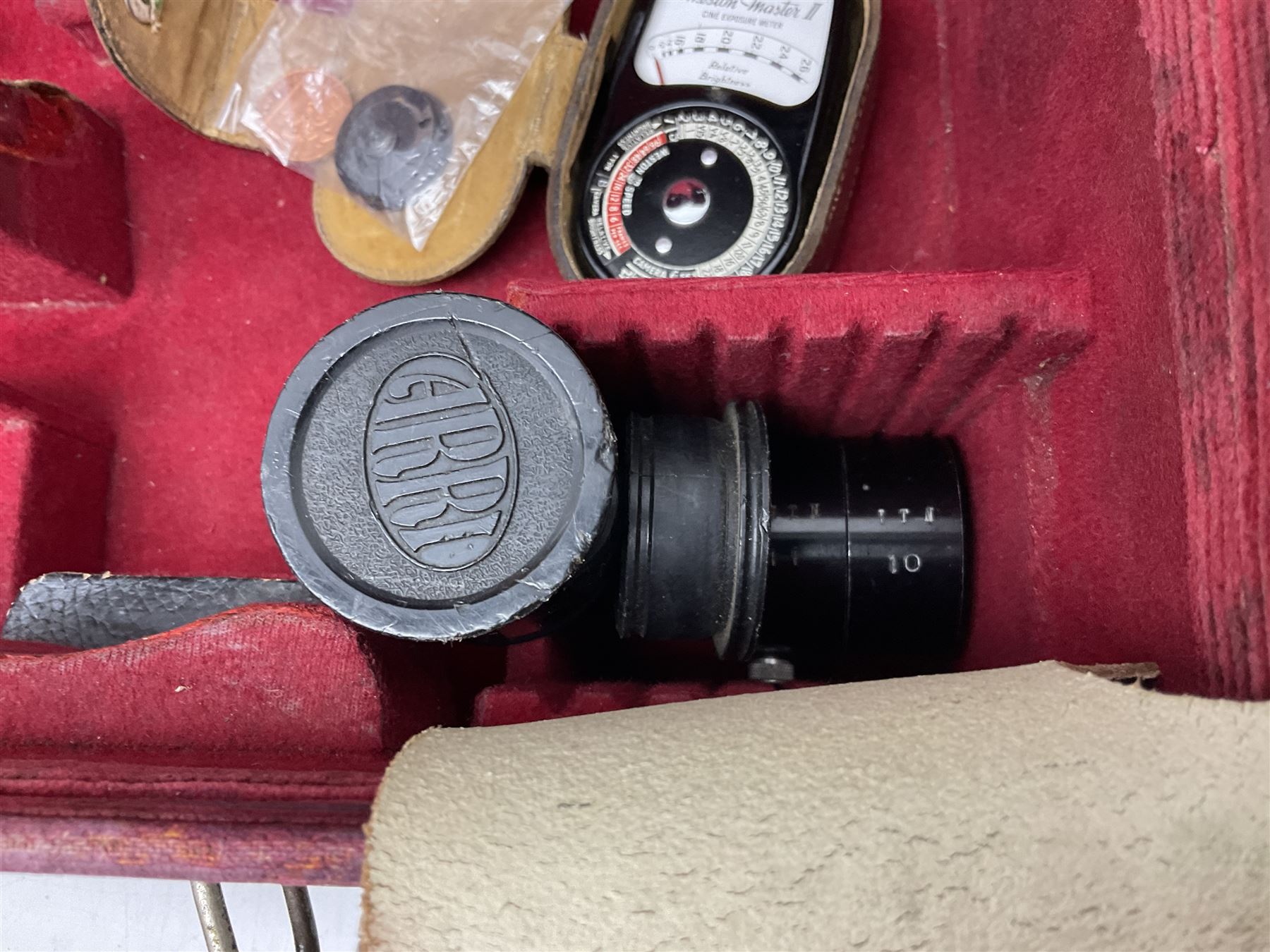 Arriflex 16SB camera body, serial no. 1784, with ' Carl Zeiss Distagon 1:2 f=8mm' lens, serial number 3860224, 'Carl Zeiss Jean Tessar 2/16' lens, serial no 3624355, camera pistol grip and other accessories, in fitted hard case