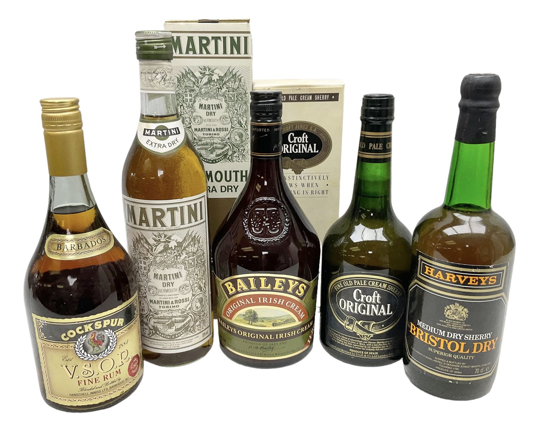 Mixed alcohol comprising Harveys Medium Dry Sherry, 70cl, one bottle, Croft Original Fine Old Pale Cream Sherry, 70cl, one bottle in box, Martini Extra Dry Vermouth, 90cl 18% vol, one bottle in box, Cockspur Barbados V.S.O.R Fine Rum, one bottle, and Baileys Irish Cream, 1l, one bottle (5)