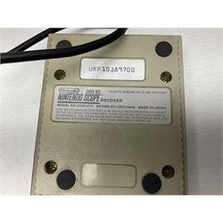 Two Super Nintendo Entertainment System (PAL) controllers, accessories and games. Super NES Game Commander with original box and instruction booklet, Super NES Nintendo Scope (1992) transmitter gun, receiver, Super NES Nintendo Scope 6 game with original instruction booklets. Further games to include ‘The Legend of Zelda a Link to the Past’, ‘Super Mario World’, ‘Super Mario Kart’, ‘The Lawnmower Man’, and ‘Exhaust Heat’, all with original instruction booklets. ‘PowerMonger’ and Disney’s ‘Aladdin’ game cartridges only 