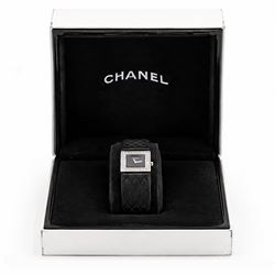 Chanel Matelassé ladies diamond stainless steel quartz wristwatch, black quilted dial, with round brilliant cut diamond bezel, back case No. 77835 and dated 2003, on quilted leather strap with fold-over-clasp 