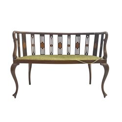 Edwardian inlaid mahogany salon settee or bench, the pierced and inlaid splat back over serpentine front, seat upholstered in laurel green velvet, raised on cabriole supports with satinwood stringing